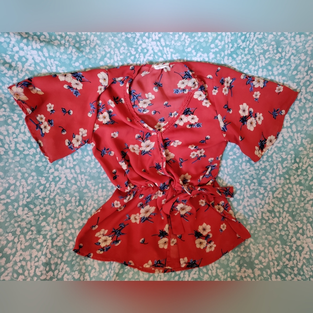 Sienna Sky faux wrap peplum top